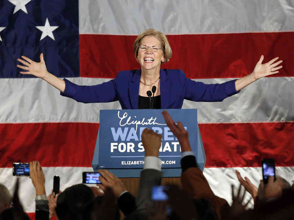 Democrat Elizabeth Warren takes the stage after defeating incumbent GOP Sen. Scott Brown in the Massachusetts Senate race on Tuesday.