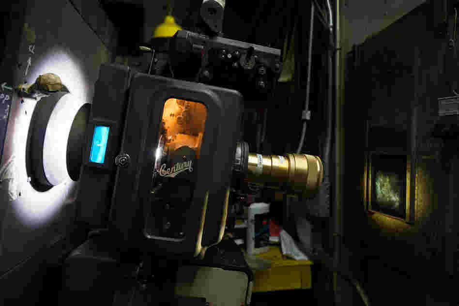Projector in the booth at Jackson Heights Cinema in Queens, N.Y., a former Bollywood theater that now shows many films subtitled in Spanish.