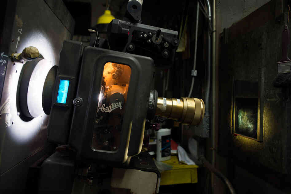 Projector in the booth at Jackson Heights Cinema in Queens, N.Y., a former Bollywood theater that now shows many films subtitled in Spanish.