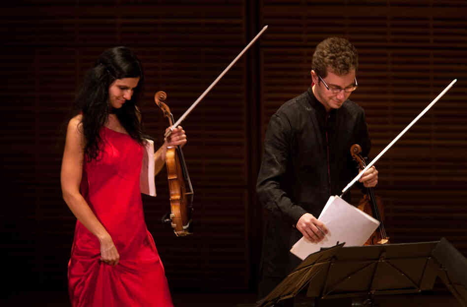 The Belcea Quartet's violinists Corina Belcea and Axel Schacher, walk onstage just before playing Beethoven's String Quartet in E flat, Op. 127. 