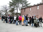 African-American turnout and enthusiasm for Obama are matching levels seen four years ago. Above, voters wait in a long line in Detroit, Mich., on Tuesday. African-American turnout and enthusiasm for Obama are matching levels seen four years ago. Above, voters wait in a long line in Detroit, Mich., on Tuesday.