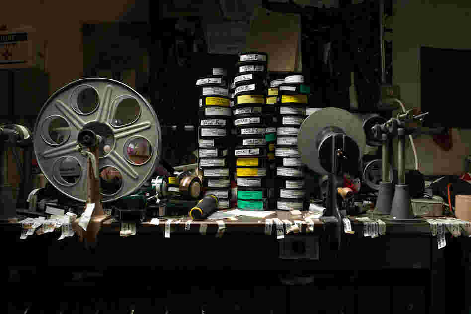 Editing table at the Avon Theater, Stamford, Conn. The table is currently stacked with trailers, or, as they're now known, previews.