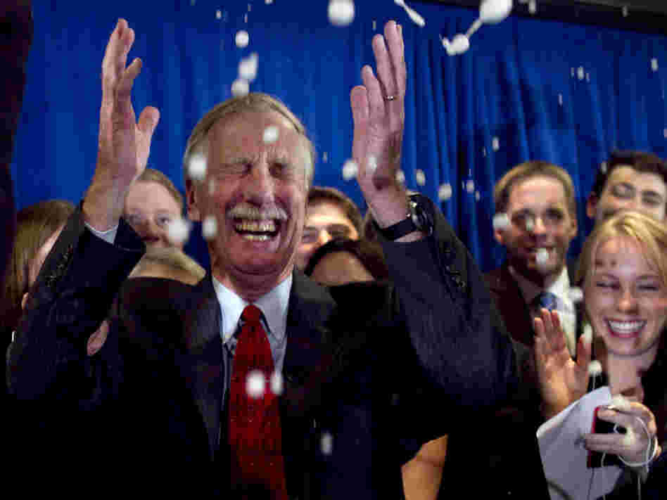 Independent Angus King celebrates under a splash of champagne in Freeport, Maine, on Tuesday after winning the Senate seat vacated by Republican Olympia Snowe.