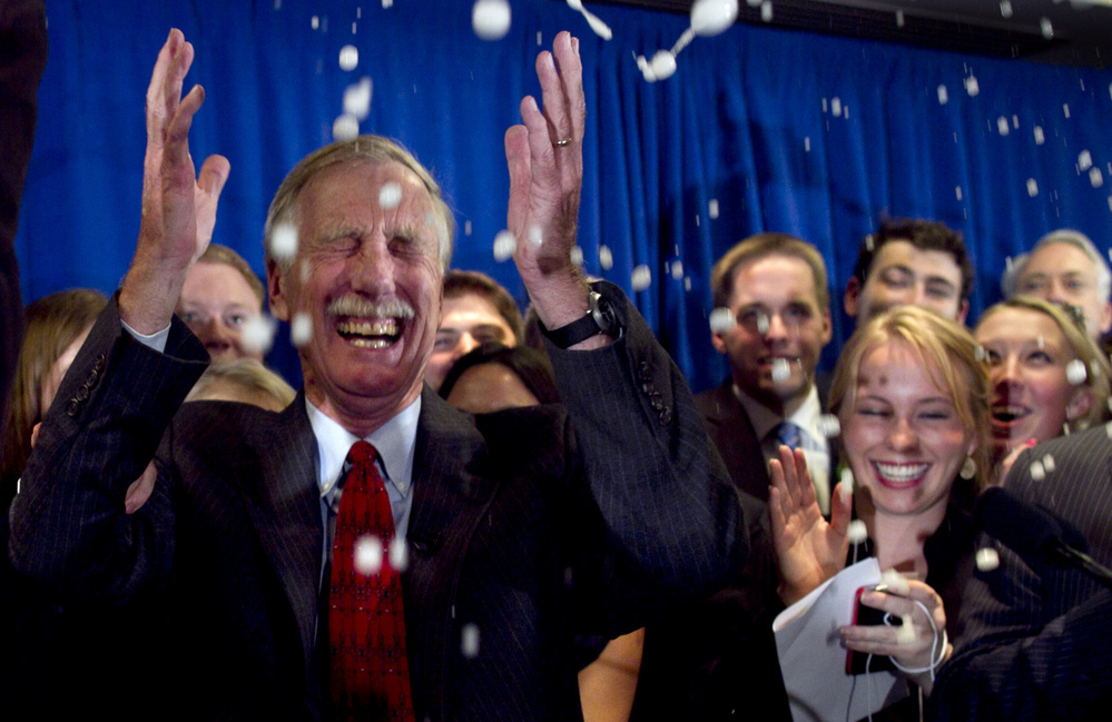 Independent Angus King celebrates under a splash of champagne in Freeport, Maine, on Tuesday after winning the Senate seat vacated by Republican Olympia Snowe.