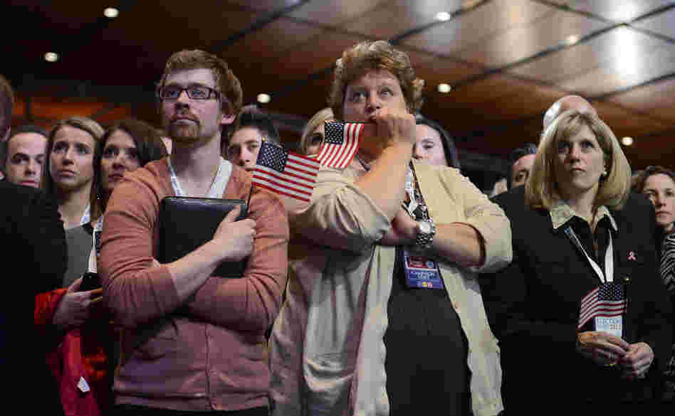 Supporters of Republican presidential candidate Mitt Romney react to his defeat in Boston.