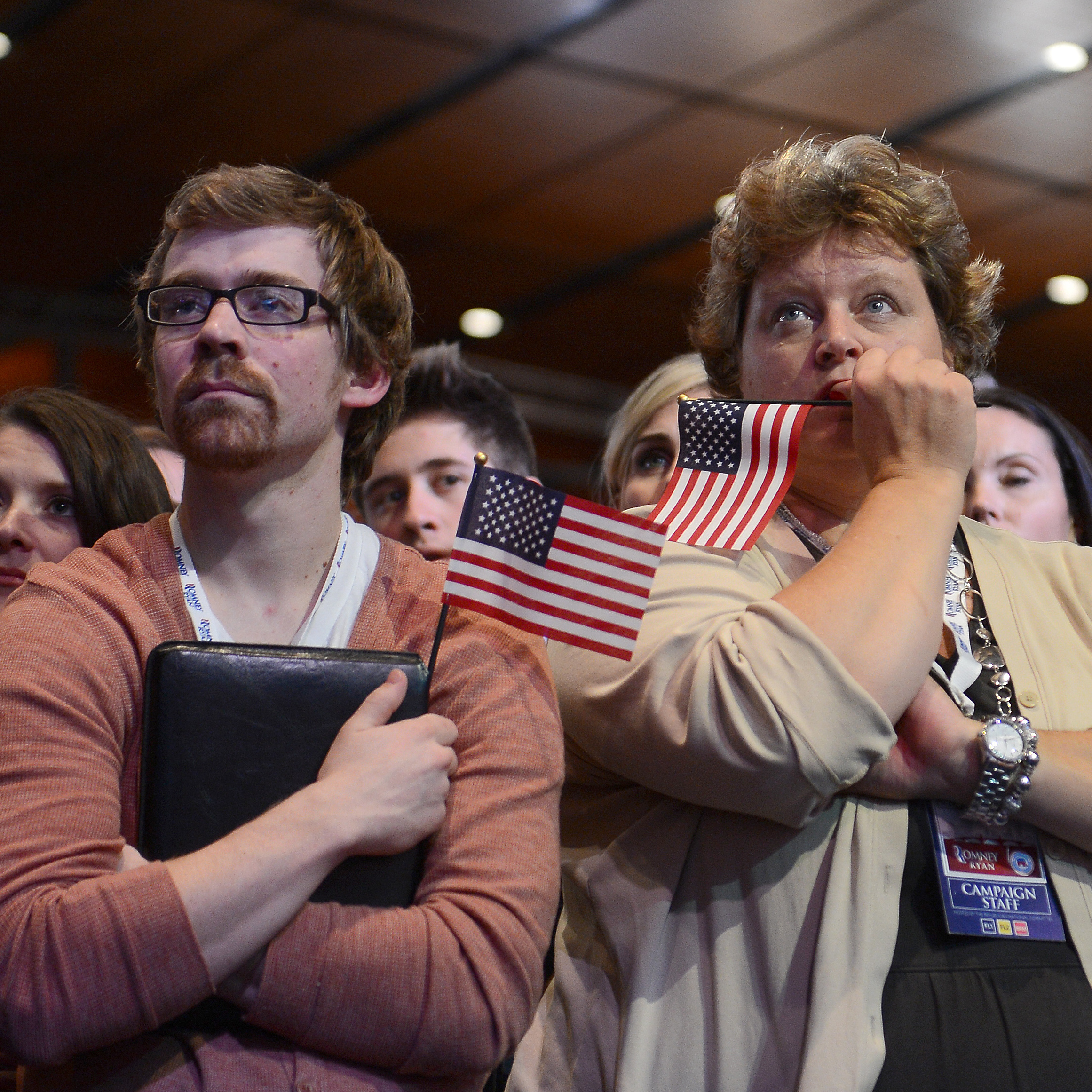 Supporters of Republican presidential candidate Mitt Romney react to his defeat in Boston.