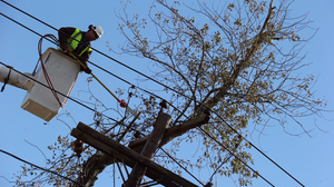 Crews work to restore power in Bethpage, N.Y., on Saturday. As of Wednesday, more than 200,000 Long Island residents were still without power, as a nor'easter made new outages likely.