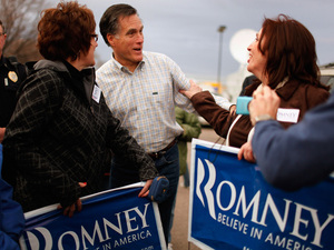Republican presidential candidate Mitt Romney talks with supporters during a campaign event at the Family Table Restaurant in Le Mars, Iowa, in 2011. Republican presidential candidate Mitt Romney talks with supporters during a campaign event at the Family Table Restaurant in Le Mars, Iowa, in 2011.