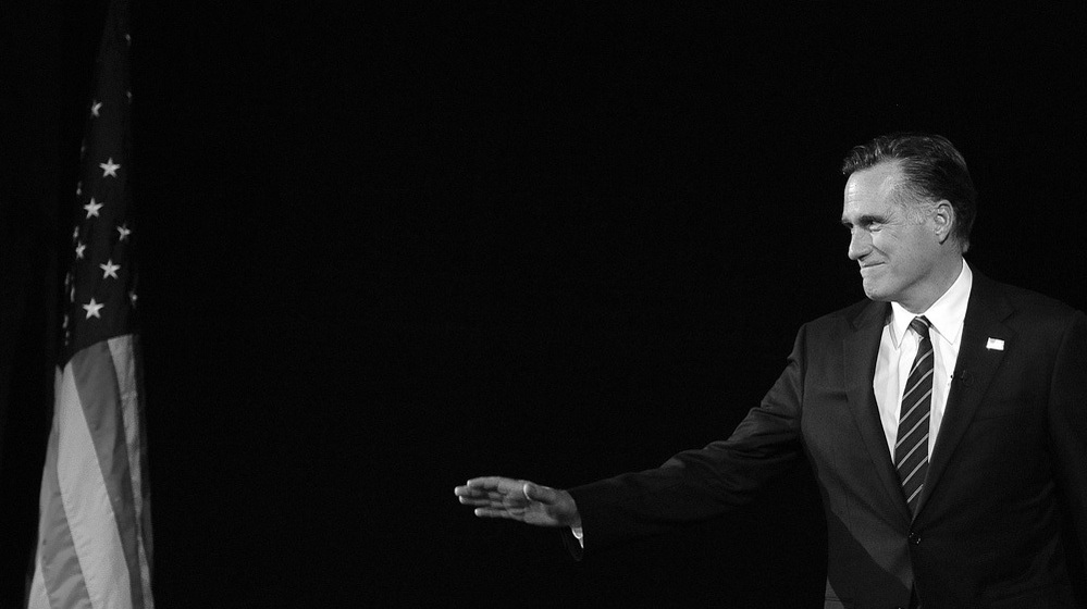Republican presidential candidate Mitt Romney arrives onstage early Wednesday morning in Boston, moments before conceding defeat in the 2012 presidential election.