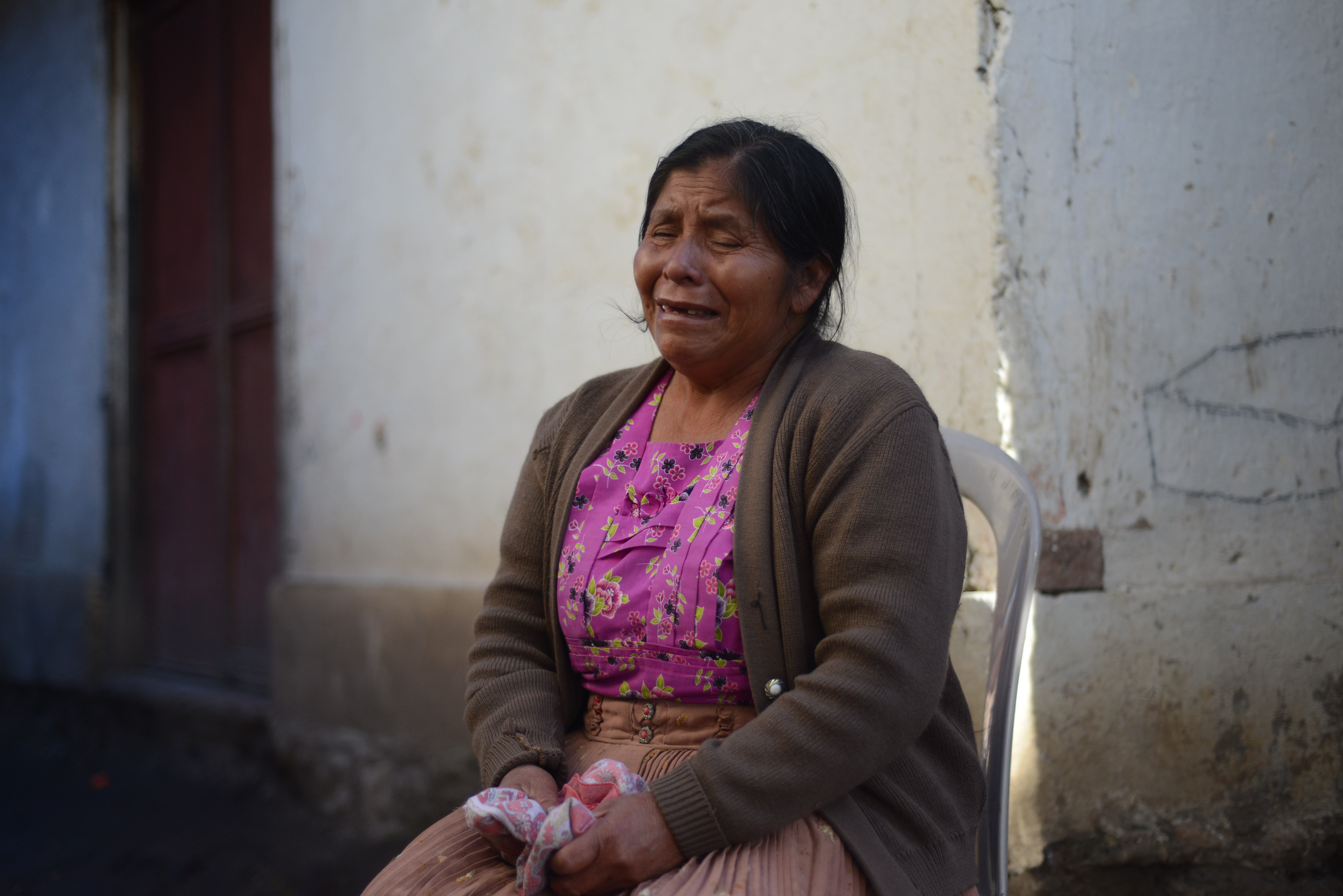 A relative mourns the ten members of the Vasquez family who died in the earthquake in the San Cristobal Cuchu municipality in San Marcos, Guatemala. A relative mourns the ten members of the Vasquez family who died in the earthquake in the San Cristobal Cuchu municipality in San Marcos, Guatemala.