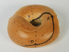 A guide to making a Mobius bagel. Cut along the black line. A guide to making a Mobius bagel. Cut along the black line.