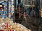 Iranian women look at a jewelry shop display in Tehran, Iran, in 2010. Iran now appears to be stockpiling gold in an attempt to stabilize its economy, which has been hit hard by Western sanctions. Iranian women look at a jewelry shop display in Tehran, Iran, in 2010. Iran now appears to be stockpiling gold in an attempt to stabilize its economy, which has been hit hard by Western sanctions.