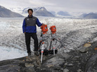 James Balog poses on the Columbia Glacier in Alaska with two EIS time-lapse cameras in 2009. James Balog poses on the Columbia Glacier in Alaska with two EIS time-lapse cameras in 2009.
