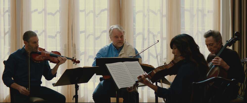 Mark Ivanir, Philip Seymour Hoffman, Christopher Walken and Catherine Keener as the Fugue String Quartet.