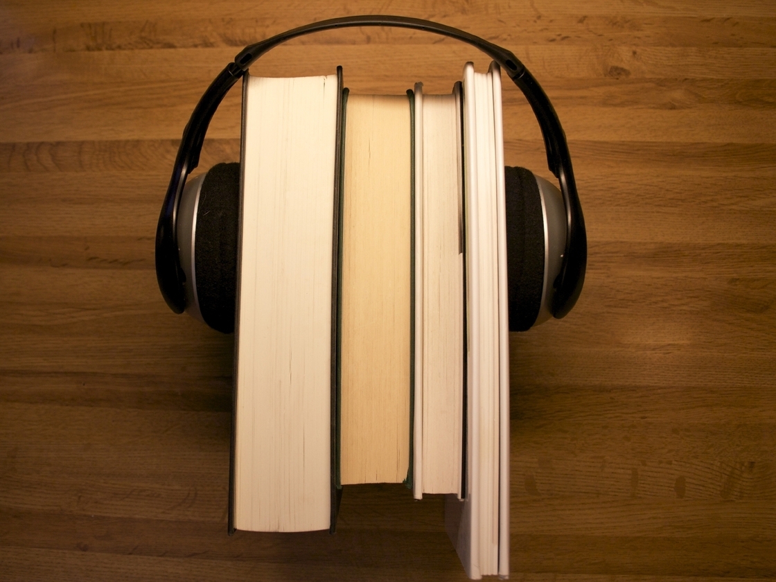 books with headphones on