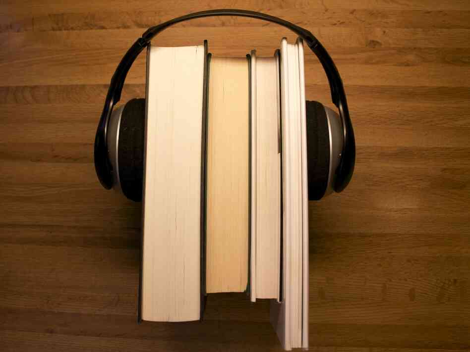 books with headphones on