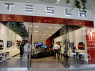 A Tesla Motors showroom in San Jose, Calif. Car dealers in New York and Massachusetts have filed a lawsuit that seeks to block Tesla from selling its vehicles in those states. A Tesla Motors showroom in San Jose, Calif. Car dealers in New York and Massachusetts have filed a lawsuit that seeks to block Tesla from selling its vehicles in those states.