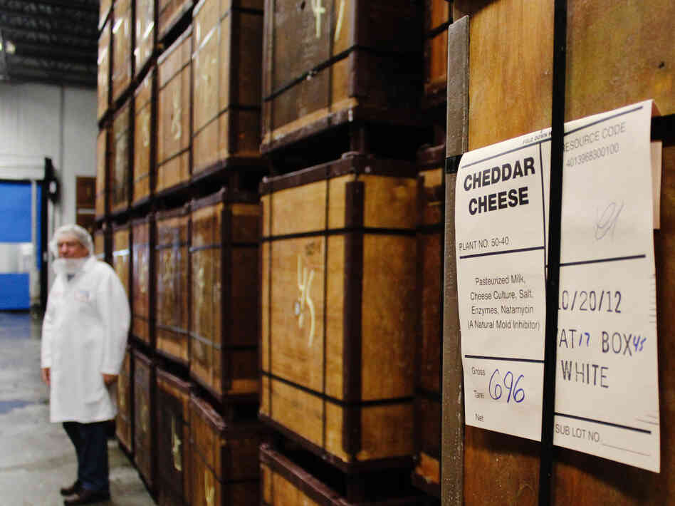 Wooden containers hold 640-pound blocks of cheddar cheese. Wooden containers hold 640-pound blocks of cheddar cheese.
