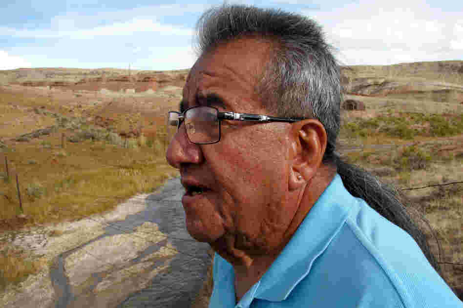 Wes Martel, vice chairman for the Eastern Shoshone Business Council, stands near a murky gray stream full of oil field wastewater. He's concerned about the effects the wastewater has on wildlife, water quality and, since cows drink it, he wonders: 