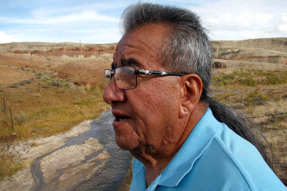 Wes Martel, vice chairman for the Eastern Shoshone Business Council, stands near a murky gray stream full of oil field wastewater. He's concerned about the effects the wastewater has on wildlife, water quality and, since cows drink it, he wonders: "What's in your steak?"