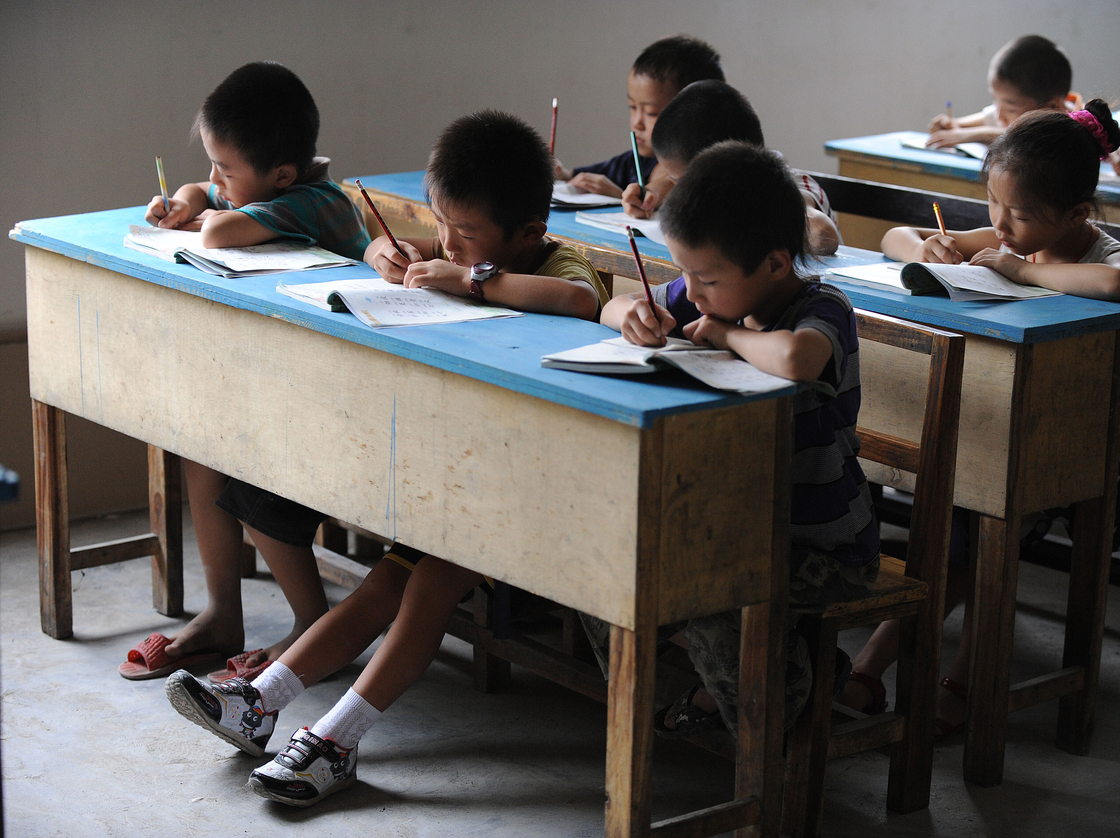 Chinese schoolchildren during lessons at a classroom in Hefei, east China's Anhui province, in 2010.