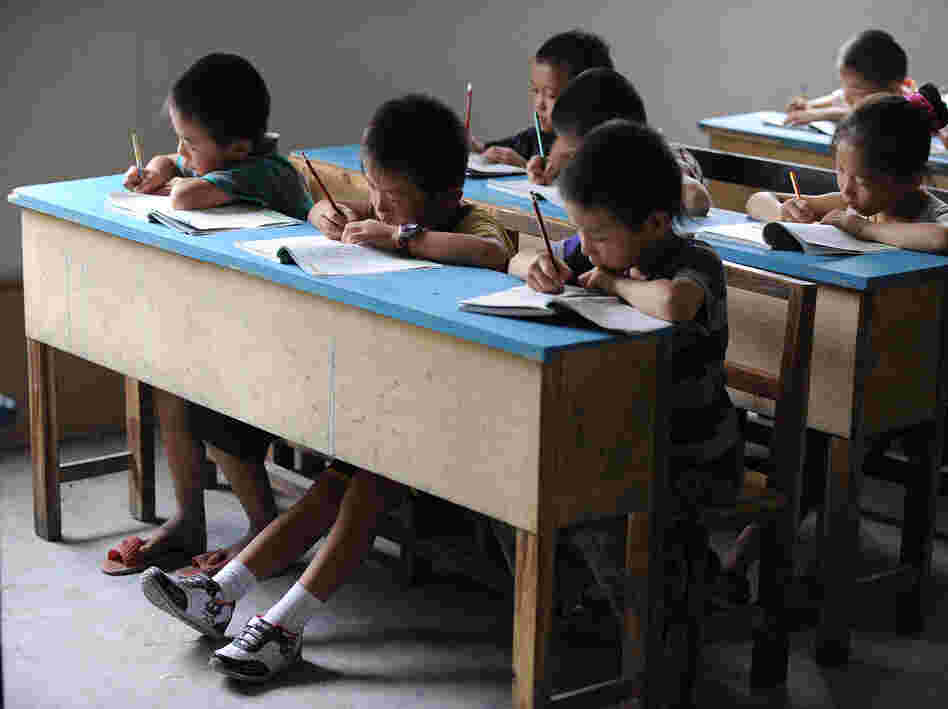 Chinese schoolchildren during lessons at a classroom in Hefei, east China's Anhui province, in 2010.