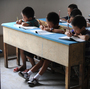 Chinese schoolchildren during lessons at a classroom in Hefei, east China's Anhui province, in 2010. Chinese schoolchildren during lessons at a classroom in Hefei, east China's Anhui province, in 2010.
