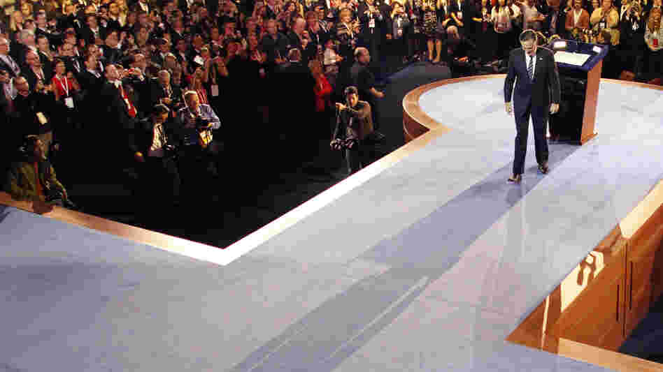 Republican presidential candidate and former Massachusetts Gov. Mitt Romney leaves the podium after conceding the presidency in Boston.