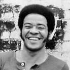 Bill Withers posing for a portrait around 1973.