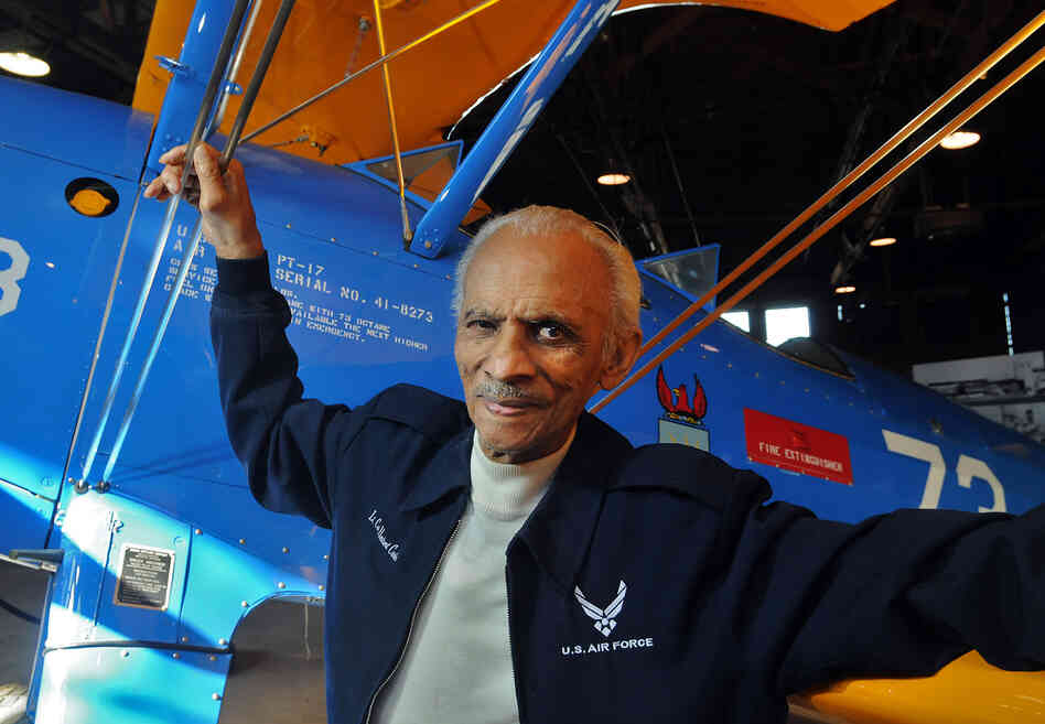 Former Tuskegee Airman Herbert Carter, in January at the Tuskegee Airmen National Historic Site in Alabama. Behind him: A  PT-17 trainer aircraft.