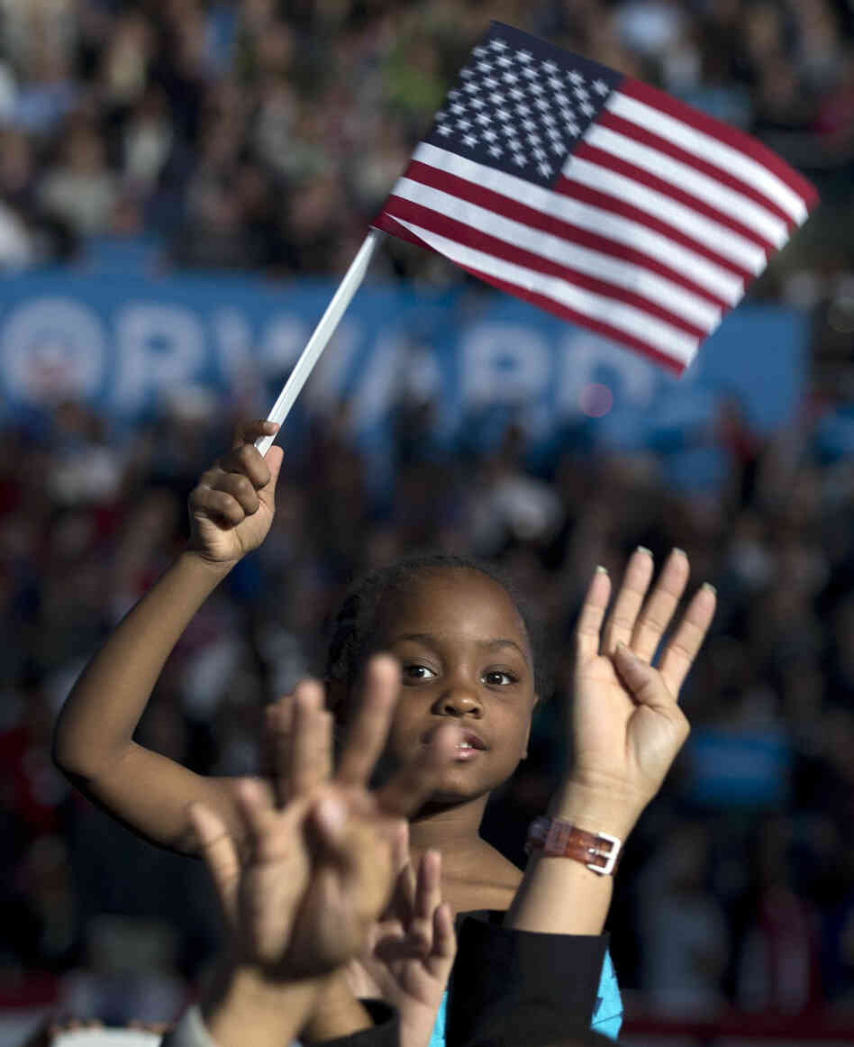 Amara Hayles, 6, sits atop her dad's shoulders as the crowd shouts "four more years" during a speech by President Obama Nov. 5 in Columbus, Ohio. Amara Hayles, 6, sits atop her dad's shoulders as the crowd shouts "four more years" during a speech by President Obama Nov. 5 in Columbus, Ohio.
