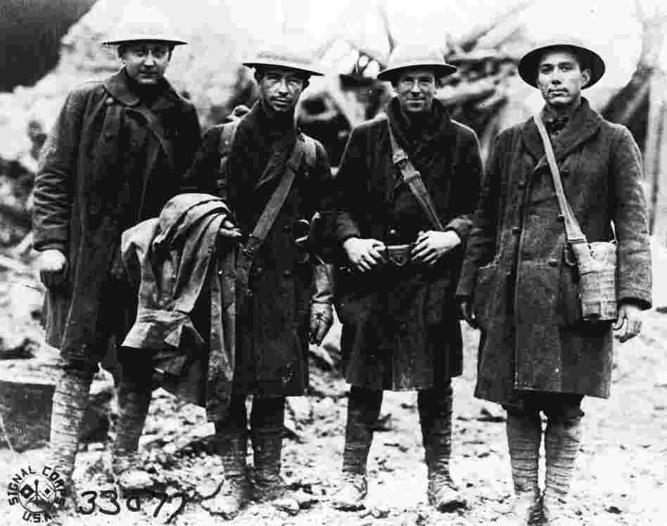 Four U.S. soldiers, runners for the 315th Infantry, pose in France in November 1918. The troops reportedly carried official orders to Lt. Col. Bunt near Etraye, France, shortly before noon, Nov. 11, 1918, announcing that the armistice had been signed, thereby ending World War I. Four U.S. soldiers, runners for the 315th Infantry, pose in France in November 1918. The troops reportedly carried official orders to Lt. Col. Bunt near Etraye, France, shortly before noon, Nov. 11, 1918, announcing that the armistice had been signed, thereby ending World War I.
