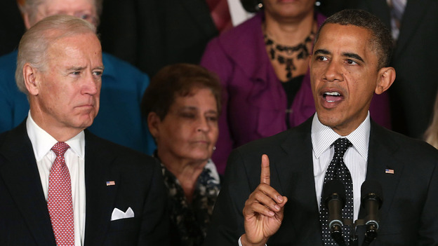Vice President Biden looks on as President Obama speaks at the White House. (Getty Images)
