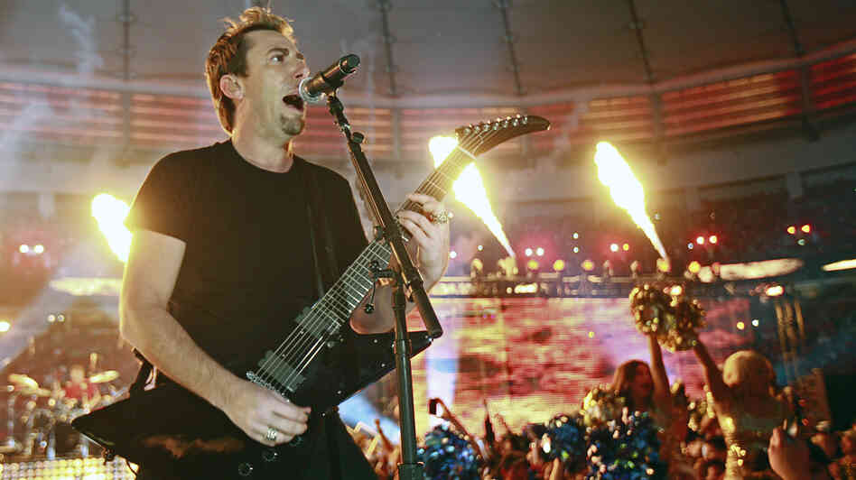Nickelback's Chad Kroeger performs during halftime of a Canadian football game in Vancouver. On the band's own tours, expensive pyrotechnics are more rare.