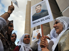 Kurdish women hold pictures of jailed journalists in Istanbul on Sept. 10, during the start of the trial of 44 journalists with suspected links to rebels from the Kurdistan Workers' Party. Kurdish women hold pictures of jailed journalists in Istanbul on Sept. 10, during the start of the trial of 44 journalists with suspected links to rebels from the Kurdistan Workers' Party.