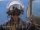 Ali, an Iraqi teenager, wears Spc. Justin Cliburn's helmet and radio equipment in Baghdad. Ali and Cliburn became unlikely friends while Cliburn trained Iraqi police in 2005 and 2006. Ali, an Iraqi teenager, wears Spc. Justin Cliburn's helmet and radio equipment in Baghdad. Ali and Cliburn became unlikely friends while Cliburn trained Iraqi police in 2005 and 2006.