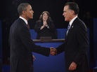 Moderator Candy Crowley applauds as President Obama shakes hands with former Massachusetts Gov. Mitt Romney during the second presidential debate on Oct. 16. Moderator Candy Crowley applauds as President Obama shakes hands with former Massachusetts Gov. Mitt Romney during the second presidential debate on Oct. 16.