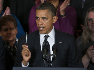 President Obama speaks about the economy and the deficit at the White House on Friday. He says this time around, he has proof that Americans agree with his approach.