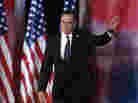 Former Massachusetts Gov. Mitt Romney waves to supporters  before giving his concession speech in Boston on Tuesday.