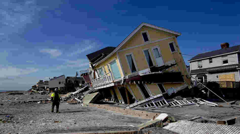 A damaged home rests on one side along the beach in the Belle Harbor section of Queens, N.Y., on Nov. 5 in the wake of Superstorm Sandy.
