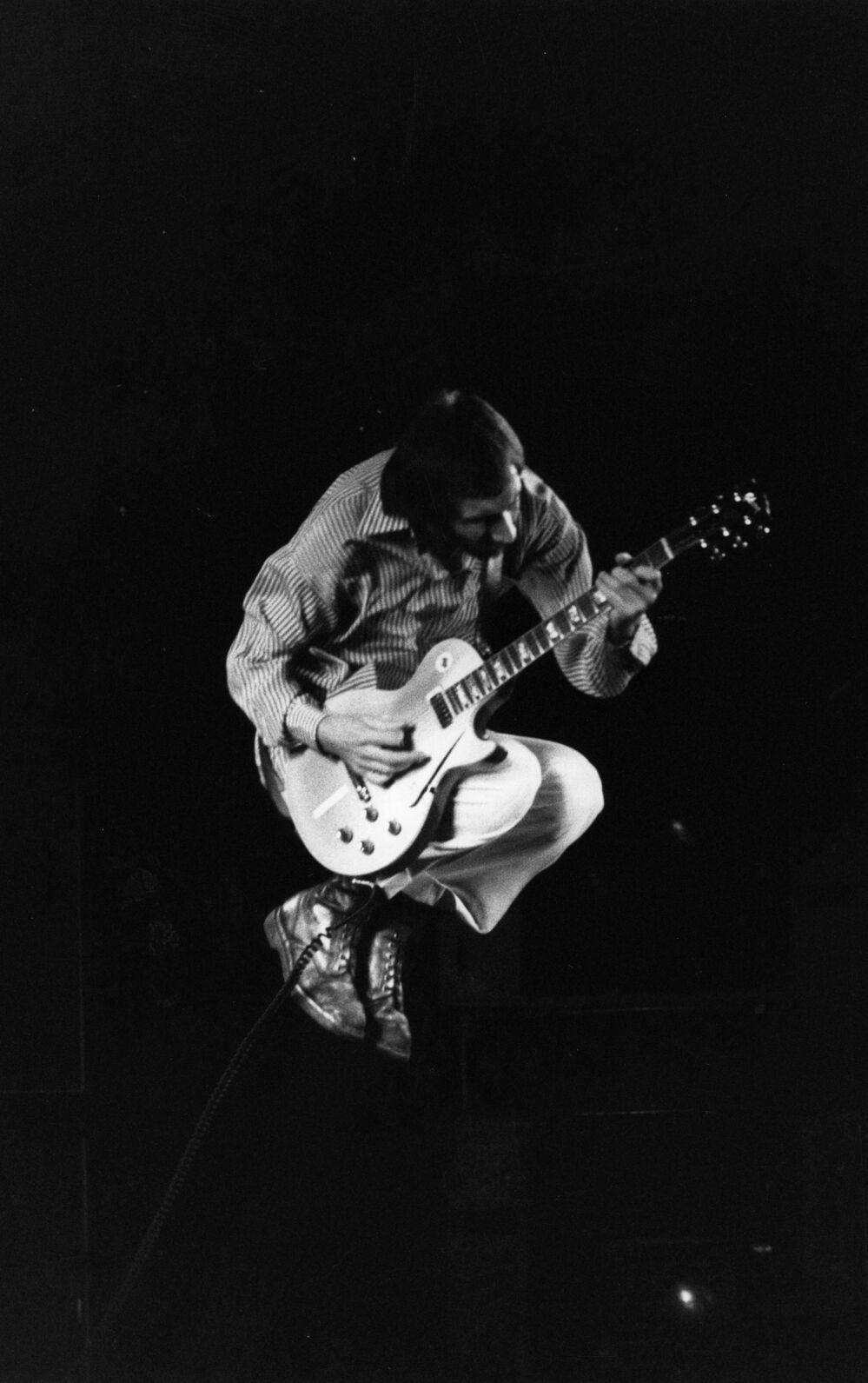 In Flight: Pete Townshend of The Who during a concert in 1975.