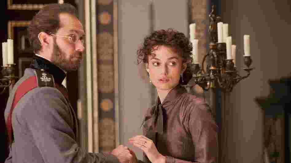 Karenin (Jude Law) tries to rein in his wife, Anna (Keira Knightley), as she pursues a flirtation and then an affair with a handsome young military officer in a new adaptation of Leo Tolstoy's iconic love story. Karenin (Jude Law) tries to rein in his wife, Anna (Keira Knightley), as she pursues a flirtation and then an affair with a handsome young military officer in a new adaptation of Leo Tolstoy's iconic love story.
