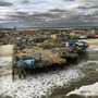 Waves break Oct. 31 in front of a destroyed amusement park wrecked by Hurricane Sandy in Seaside Heights, N.J.