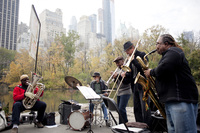 Tuba player Bob Stewart's quintet played at the pond, near the southeast entrance of the park.