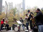 Tuba player Bob Stewart led a quintet at the pond in the southeast corner of Central Park. Tuba player Bob Stewart led a quintet at the pond in the southeast corner of Central Park.
