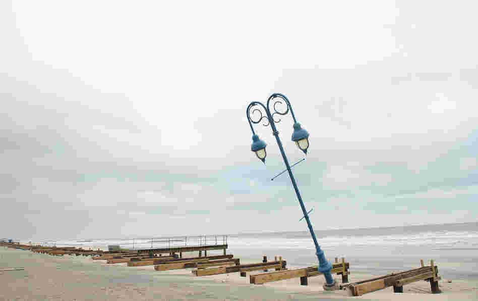 What remains of the 1.2-mile boardwalk sits on the beach on Oct. 30 in Belmar, N.J.