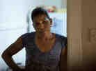 Desiree (Phyllis Montana-LeBlanc) takes the initiative to document shady construction projects.