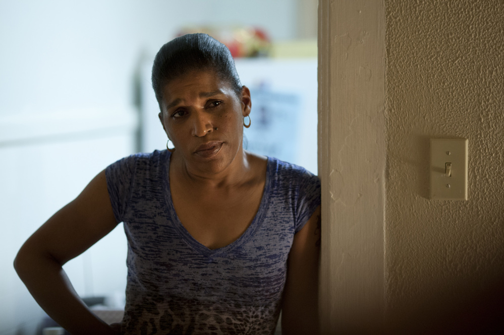 Desiree (Phyllis Montana-LeBlanc) takes the initiative to document shady construction projects.