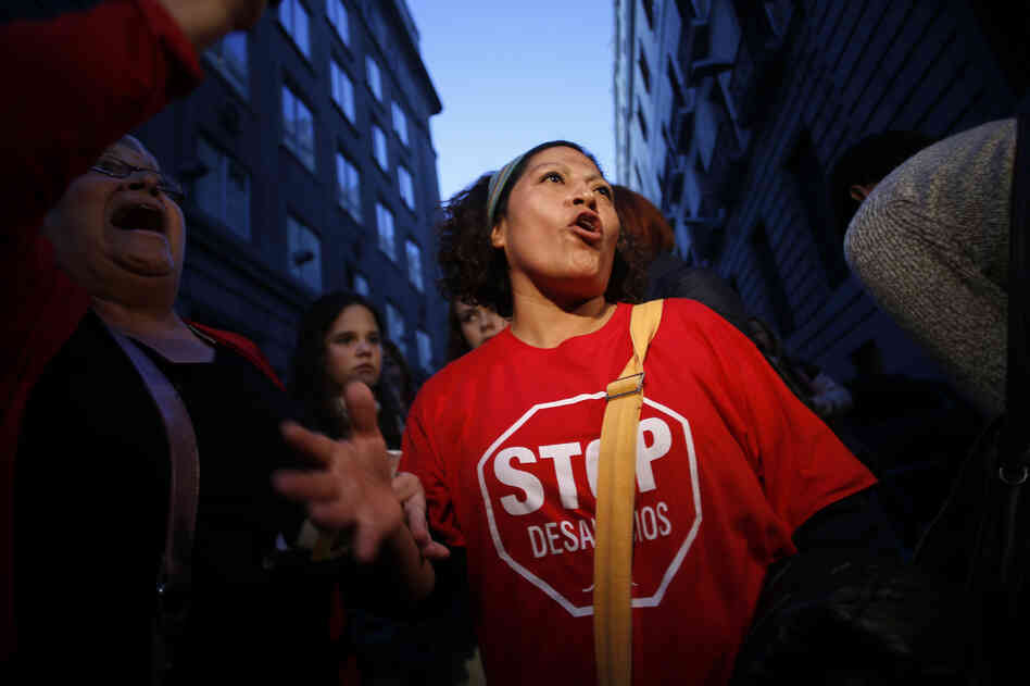 Olga Veloso protests banking giant Bankia last month in Madrid. Veloso and her neighbors have twice blocked bailiffs from evicting her from her apartment after she lost her job and stopped paying the mortgage. Olga Veloso protests banking giant Bankia last month in Madrid. Veloso and her neighbors have twice blocked bailiffs from evicting her from her apartment after she lost her job and stopped paying the mortgage.