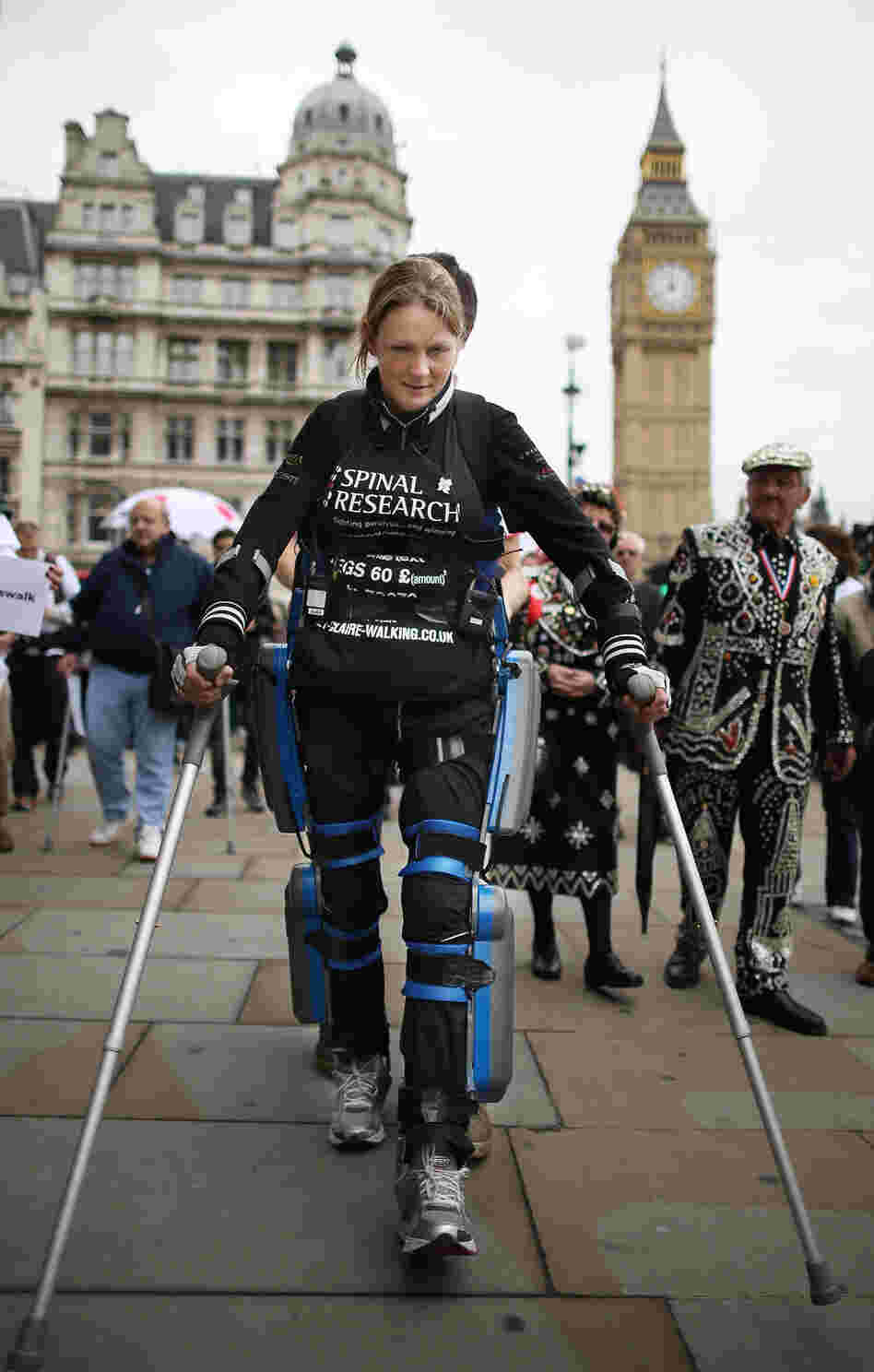 Claire Lomas, a paraplegic, walks the last mile of the London Marathon in May 2012. Starting out with 36,000 other runners, she averaged two miles a day with the help of a bionic ReWalk suit by Argo Medical Technologies.